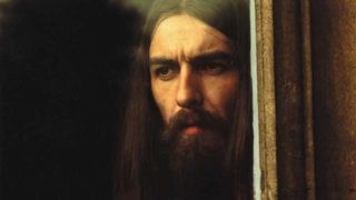 George Harrison looking out of a window
