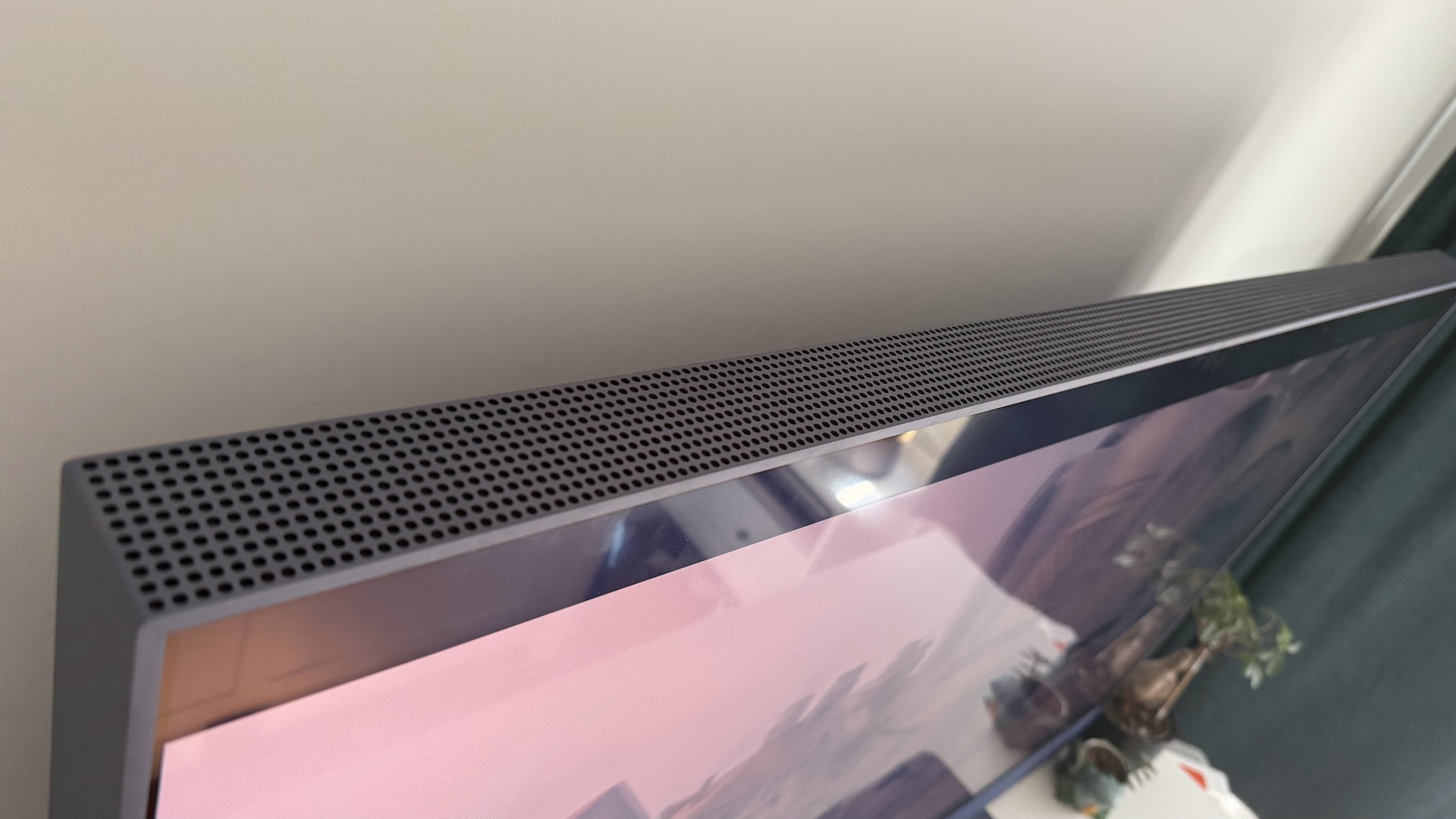 The Sky Glass Gen 2 screen on a white cabinet