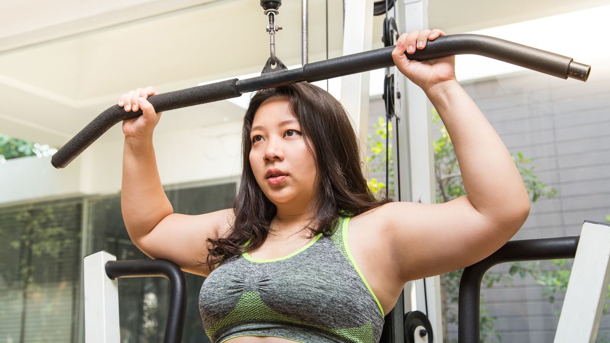Lifting heavy weights can help your body burn fat Here's how to get