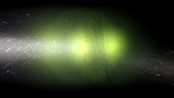 A funnel on the seafloor spied by Falkor's underwater video camera matches the funnel of the Terra Nova.