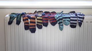 Matched pairs of socks on a radiator