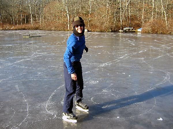 Mary demonstrates how to skate in circles.