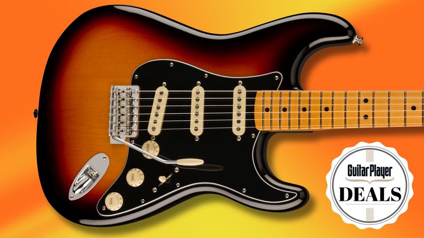 A Fender Vintera II 70s Stratocaster electric guitar on an orange and yellow background