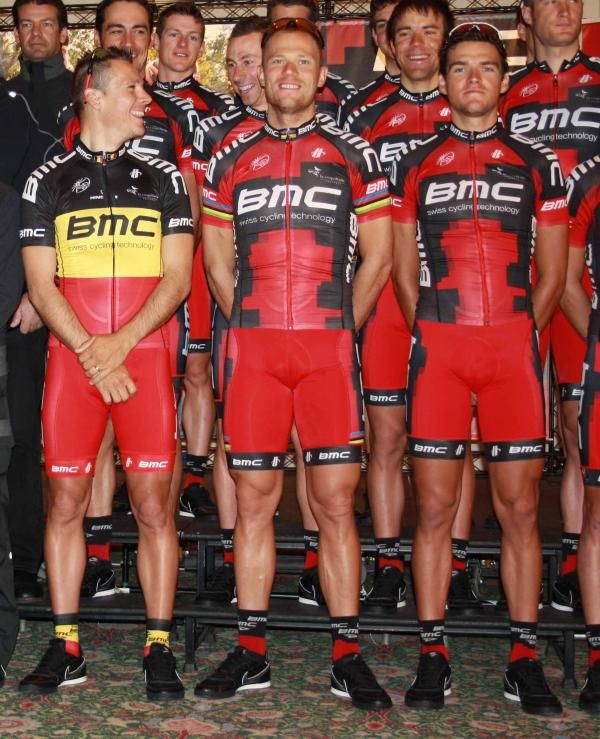 Philippe Gilbert jokes with Thor Hushovd while Greg Van Avermaet looks on at the BMC team presentation.