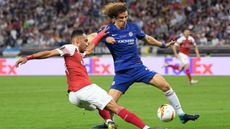 Chelsea defender David Luiz in action against Arsenal striker Pierre-Emerick Aubameyang 