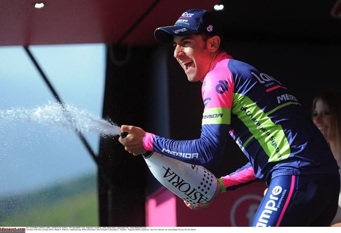 Diego Ullisi opens the champagne