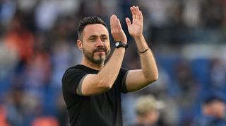 Brighton manager Roberto De Zerbi applauds the fans after the Seagulls' 2-2 draw against Liverpool in October 2023.