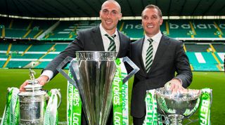 27/05/17 WILLIAM HILL SCOTTISH CUP CELEBRATION.CELTIC PARK - GLASGOW.Celtic's Scott Brown and manager Brendan Rodgers with the William Hill Scottish Cup, Ladbrokes Premiership and Betfred Cup in Celtic Park (Photo by Paul Devlin - SNS Group\SNS Group via Getty Images)