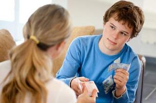 Mum giving her son money