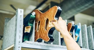 A Powers Electric A-Type in production: applying a similar amount of attention to detail to the electric builds as Taylor puts into its acoustic guitars