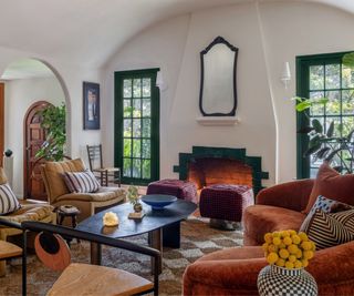 eclectic color rich living room centered around a fire place