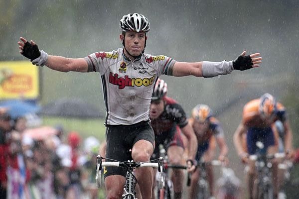 Water pours off Kirchen who doesn't seem to mind - he requested a rainy finish!