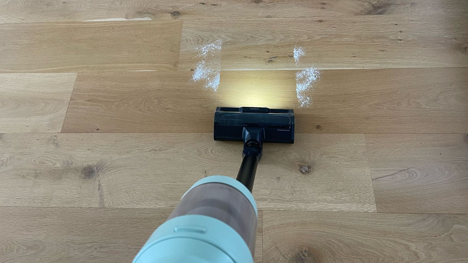 Samsung Bespoke AI Jet Ultra Vacuum on wood