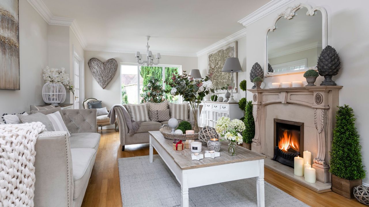 white living room with sofa and fire place