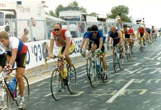 Bugno sits behind Bjarne Riis during the race in Benidorm
