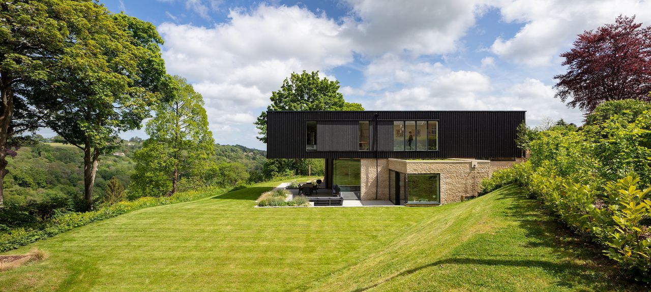 side view of cantilevered house on steep slope