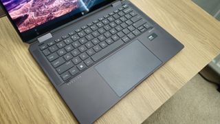 HP Spectre x360 14 (2024) keyboard and a small corner of the screen