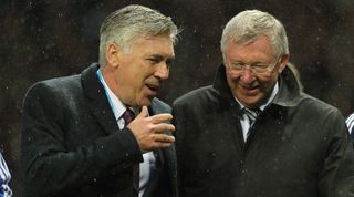 Carlo Ancelotti and Sir Alex Ferguson share a joke during the David Beckham Match for Children in aid of UNICEF at Old Trafford in November 2015.