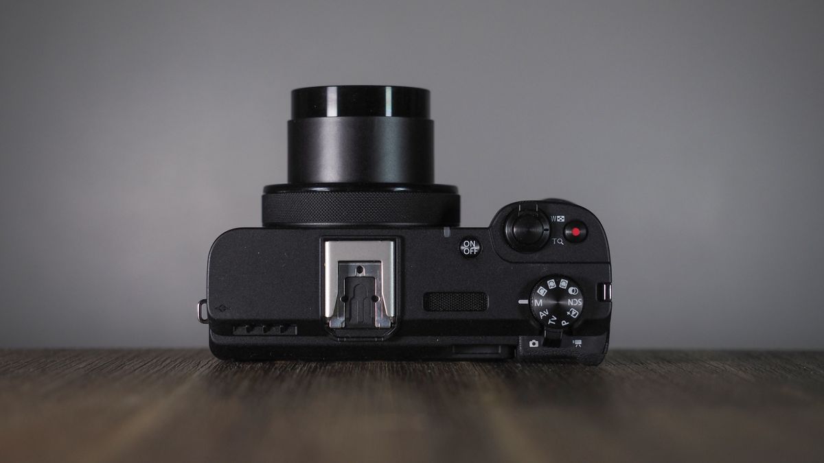 Canon PowerShot V1 on a wooden surface