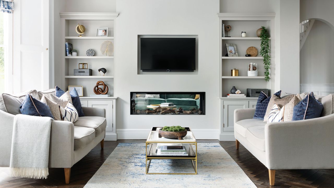 living room with TV and two sofas