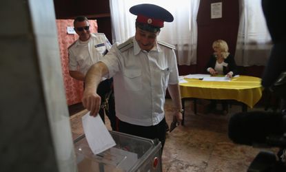 Eastern Ukraine votes in disputed sovereignty referendum