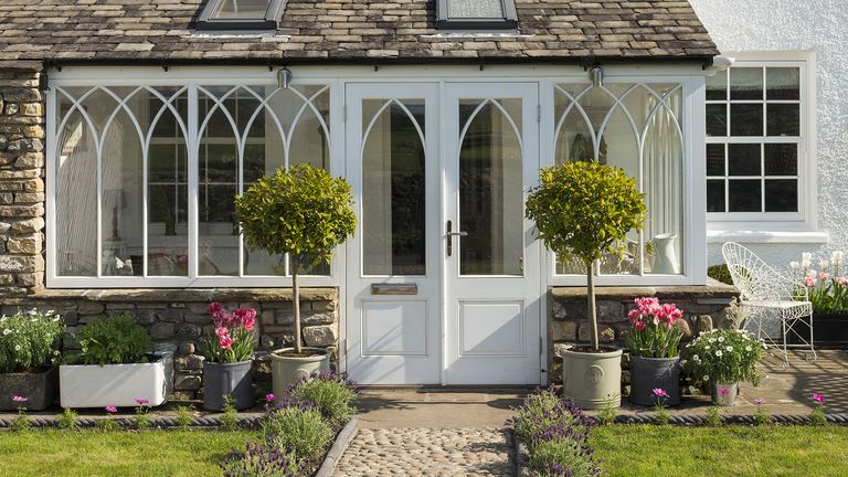 Cottage porch ideas – add a sunroom to the front of your house with period detailing