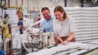 Tom's Guide mattress tester taking part in sewing in 3z factory tour