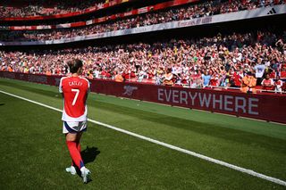 Steph Catley of Arsenal applauds fans after the Barclays Women's Super League match between Arsenal FC and Manchester United FC at Emirates Stadium on May 10, 2025 in London, England.