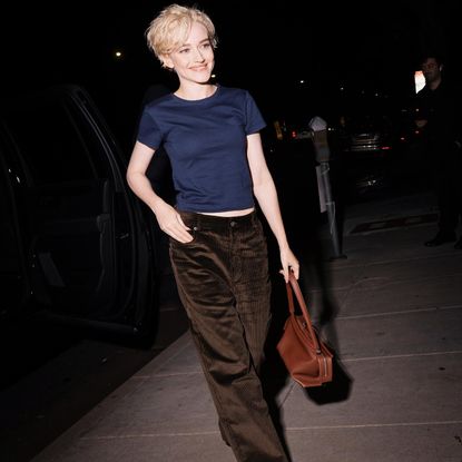 Julia carries the loewe whisker bag.