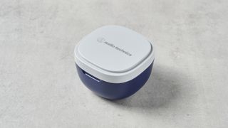 An Audio-Technica ATH-SQ1TW wireless earbuds case