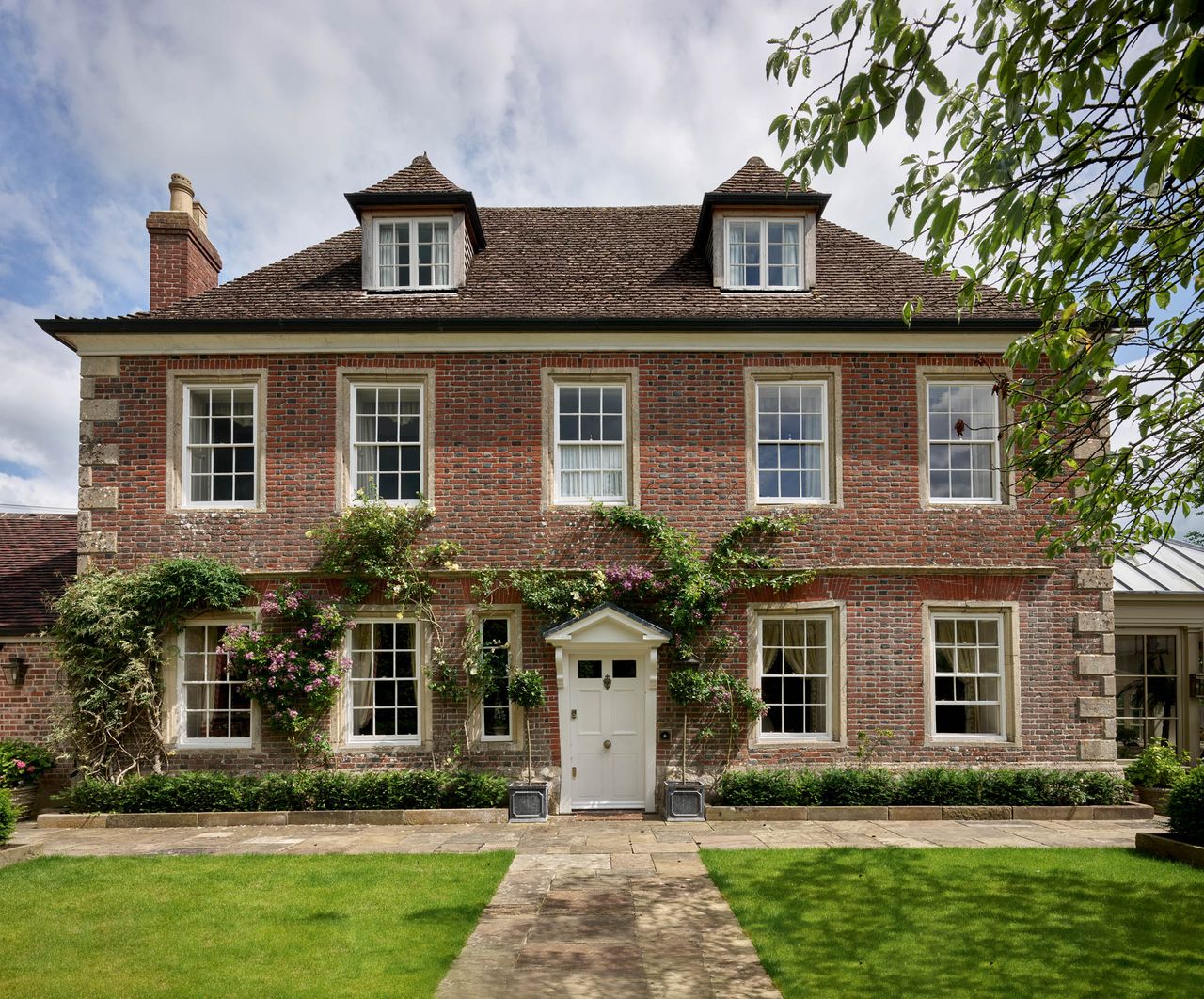 Fig 1: The garden front. Note the burnt brick patterning and the stone detailing. Chandler’s House, Alton Barnes, Wiltshire. Photograph: Paul Highnam for the Country Life Picture Library. ©Country Life