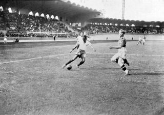 Brazil's Leônidas controls the ball in a game against Sweden at the 1938 World Cup.