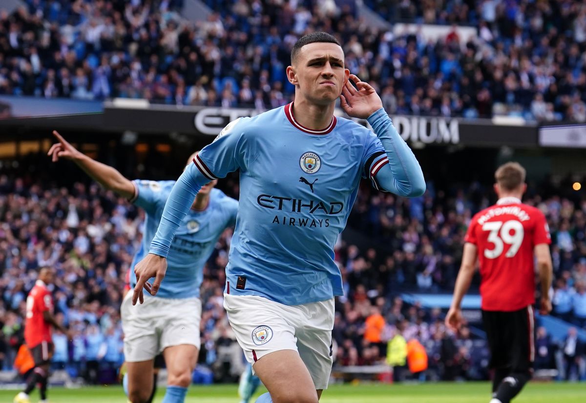  Phil Foden of Manchester City celebrates scoring a goal during a match against Manchester United at the Etihad Stadium.