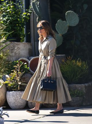 Jennifer Lopez in Repetto ballet falts and a Dior shirt dress
