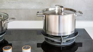 a stainless steel pan on a hob