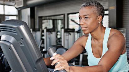 woman trying out elliptical workout ideas