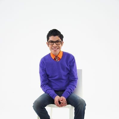 Mondo Guerra in purple sweater