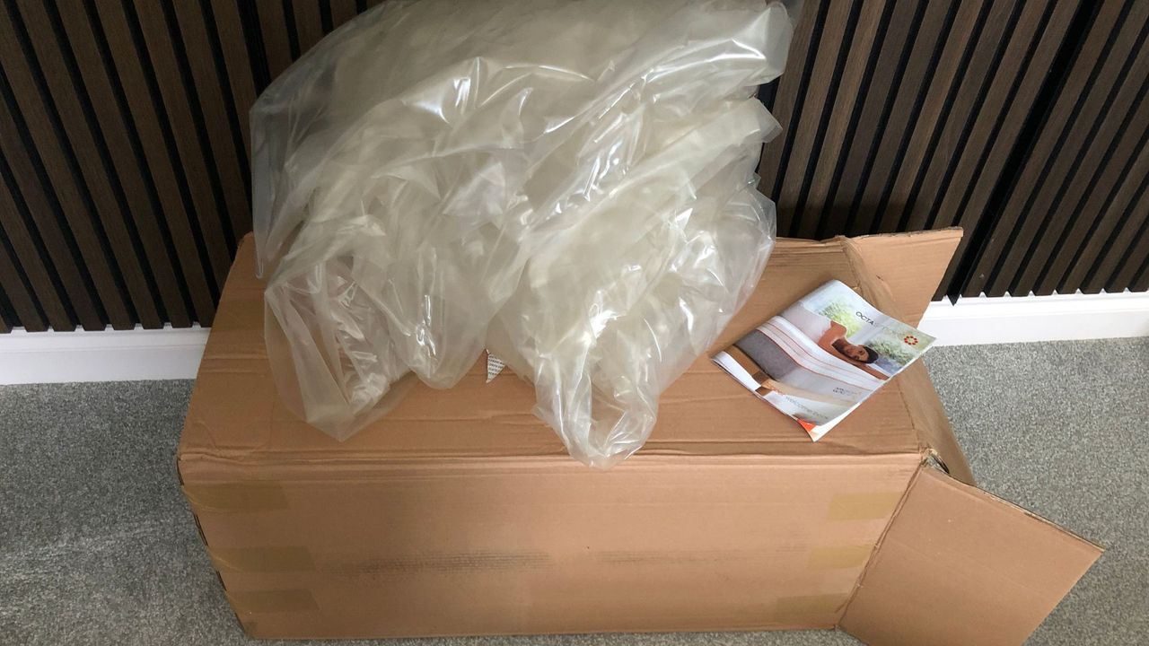 The waste left over from unpacking the Octasmart Deluxe Topper