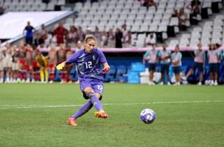 Ann-Katrin Berger #12 of Team Germany scores the team's fifth and winner penalty in the penalty shoot out during the Women's Quarterfinal match between Canada and Germany during the Olympic Games Paris 2024 at Stade de Marseille on August 03, 2024 in Marseille, France.