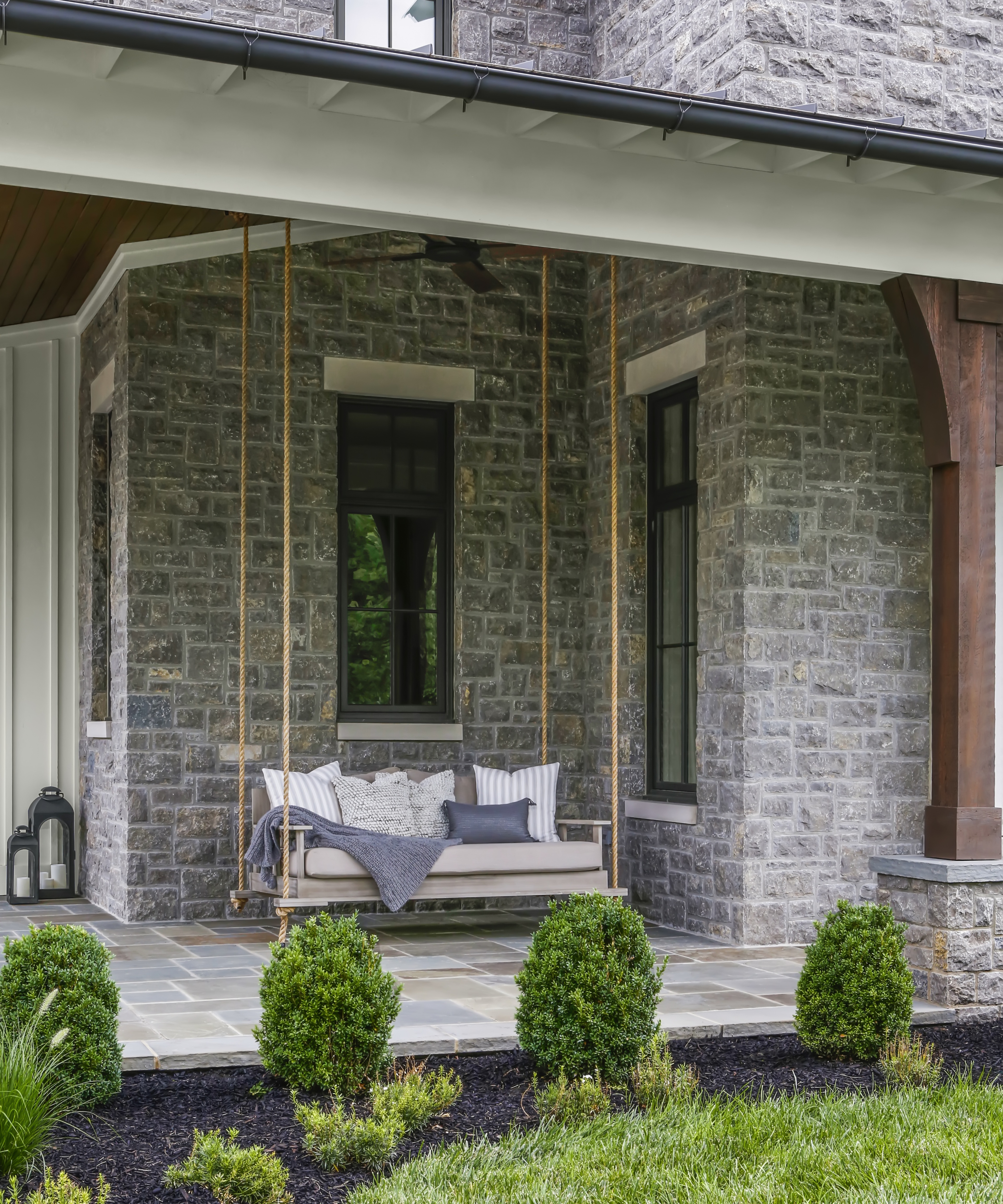 bed swing on modern farmhouse porch