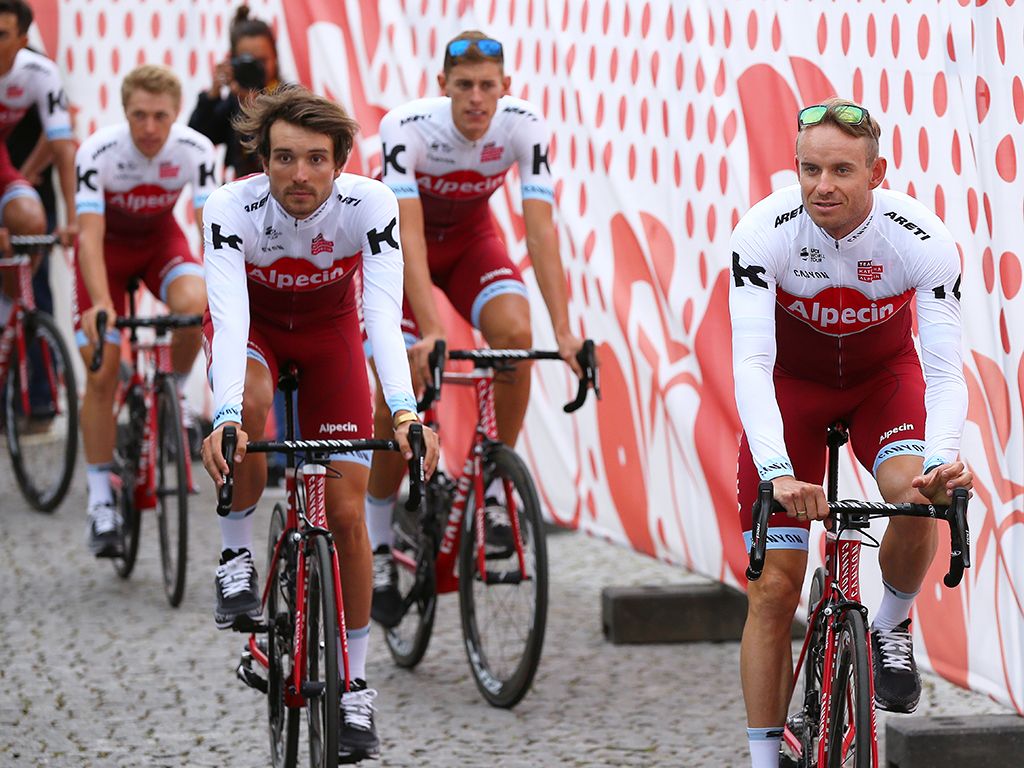 Team Katusha-Alpecin switched from an all red design to a design with white sleeves, shoulders and upper