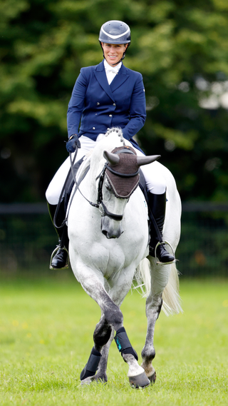 Zara Tindall warms up on her horse 'Classicals Euro Star' before competing in the dressage phase of the 2023 Festival of British Eventing at Gatcombe Park on August 4, 2023 in Stroud, England