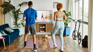 Two people doing a virtual workout