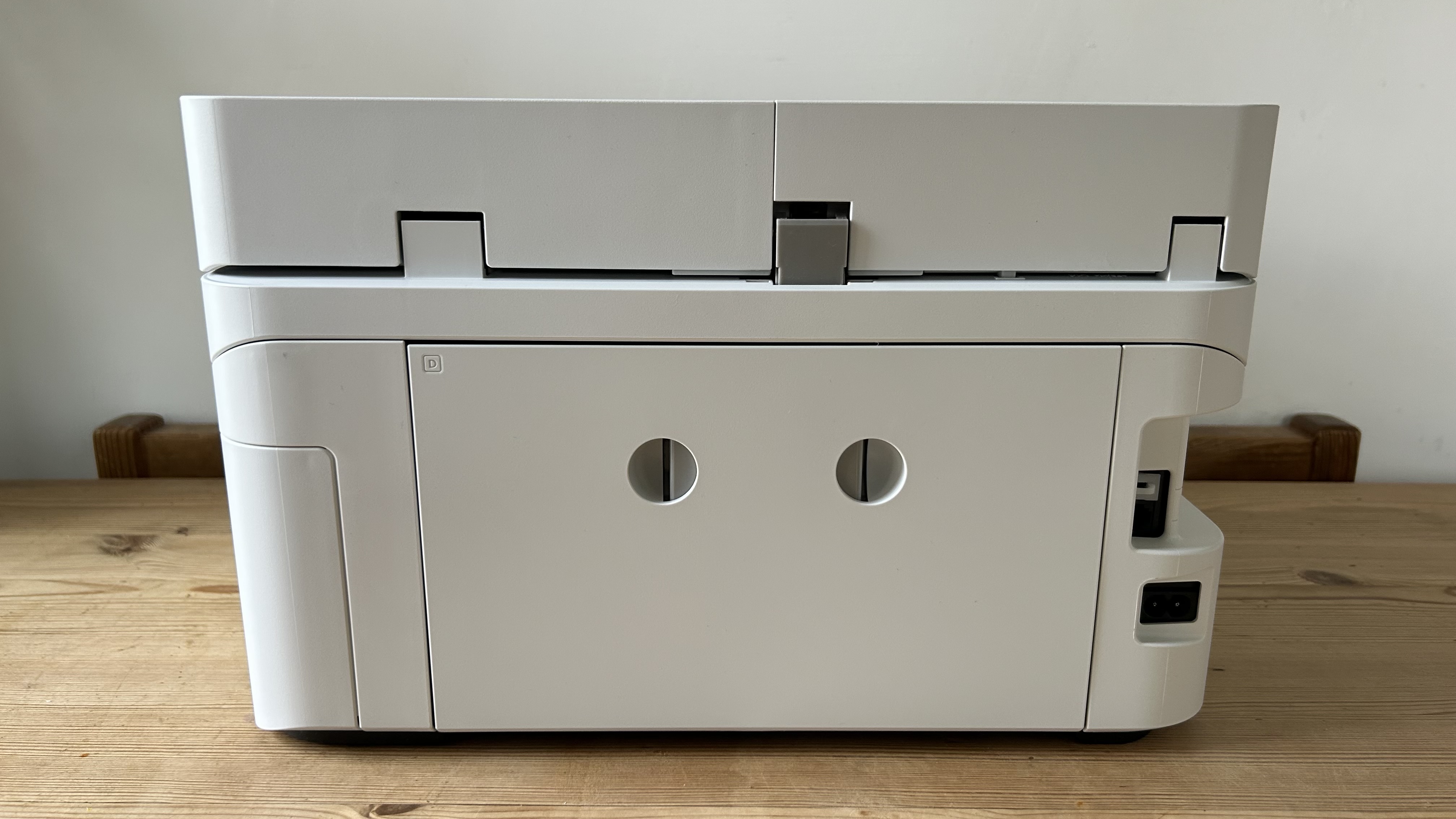 The Epson EcoTank ET-4950 series ink tank printer undergoing testing in a home office during our review process