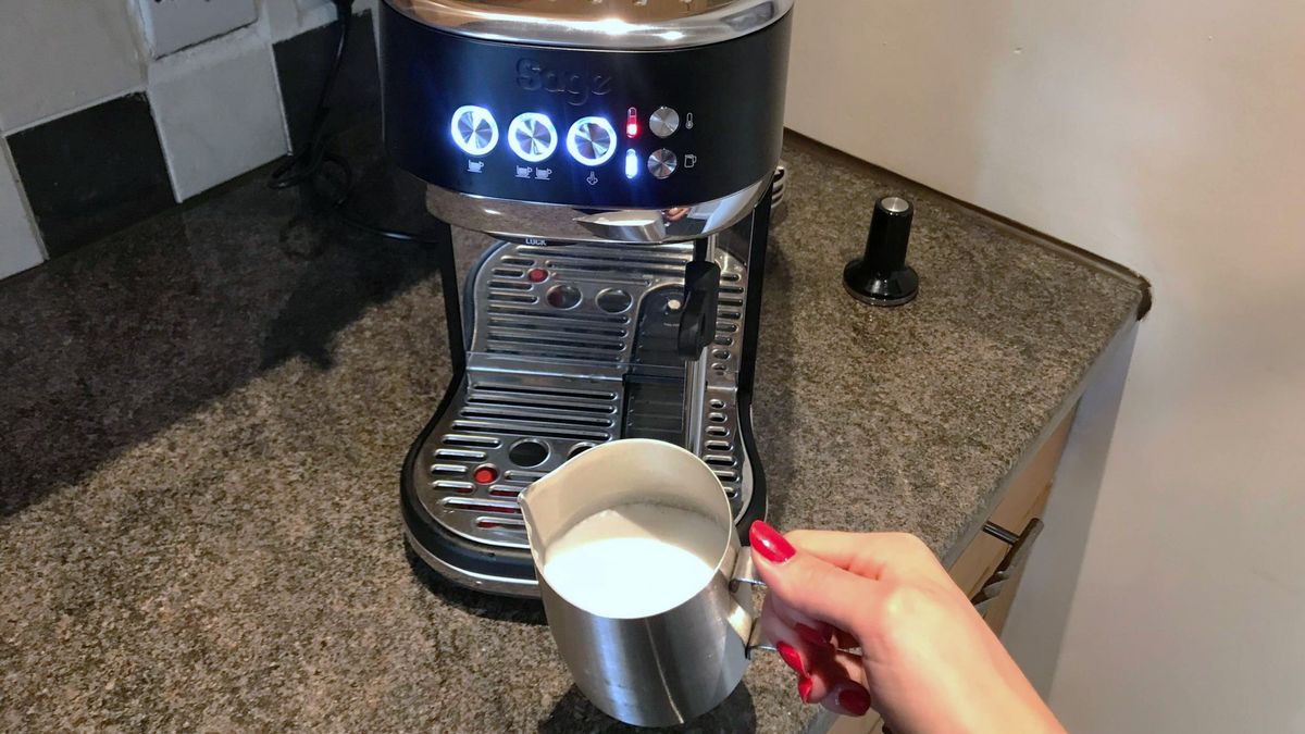 Breville Bambino Plus coffee maker on kitchen counter