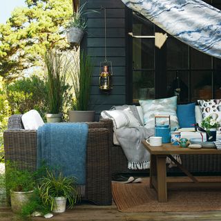Rattan garden furniture set with table