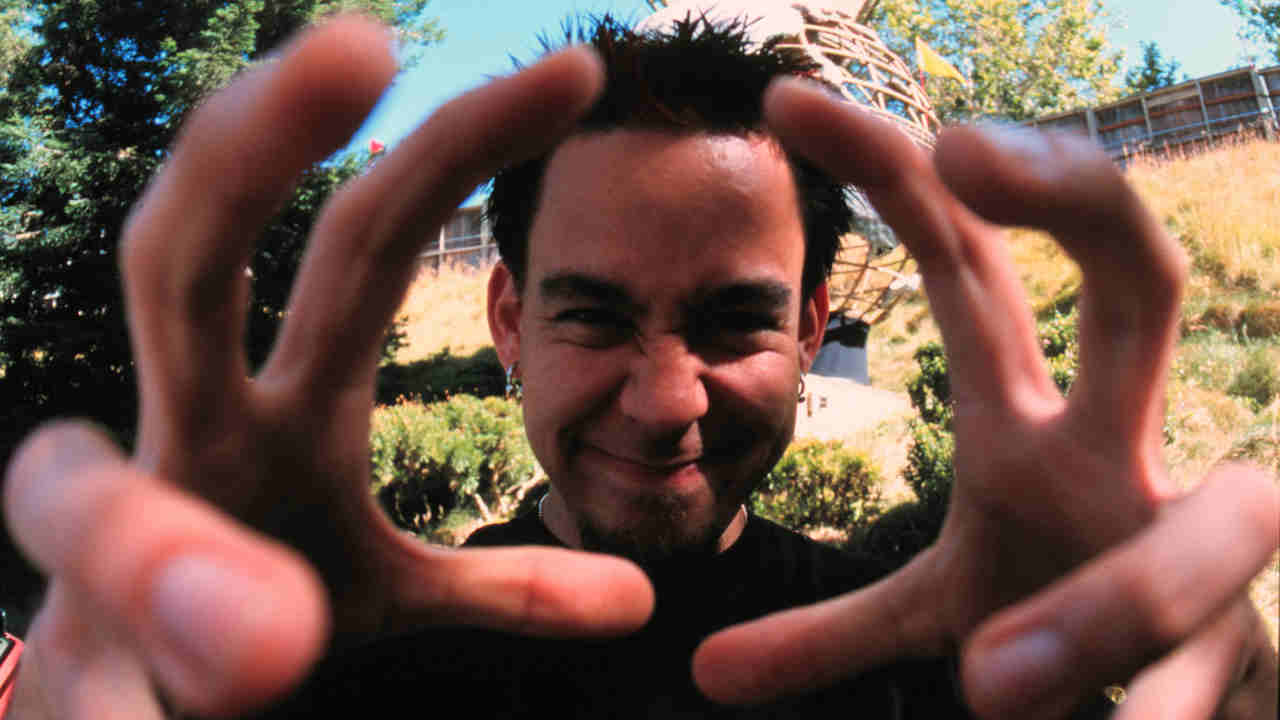 Linkin Park’s Mike Shinoda posing for a photograph in 2001