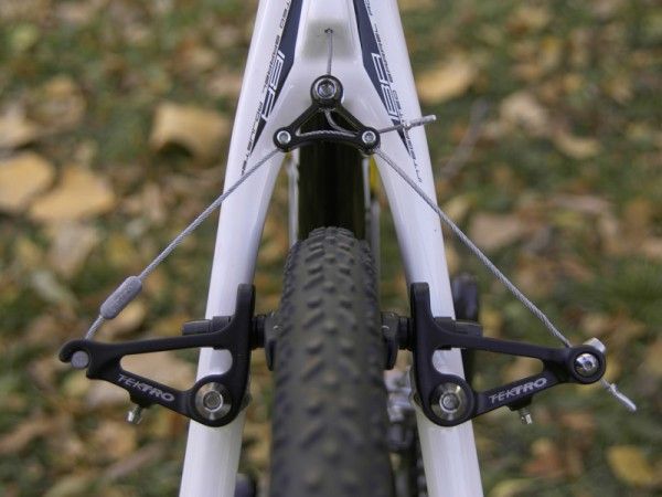 There is gobs of clearance up top for mud to pass through