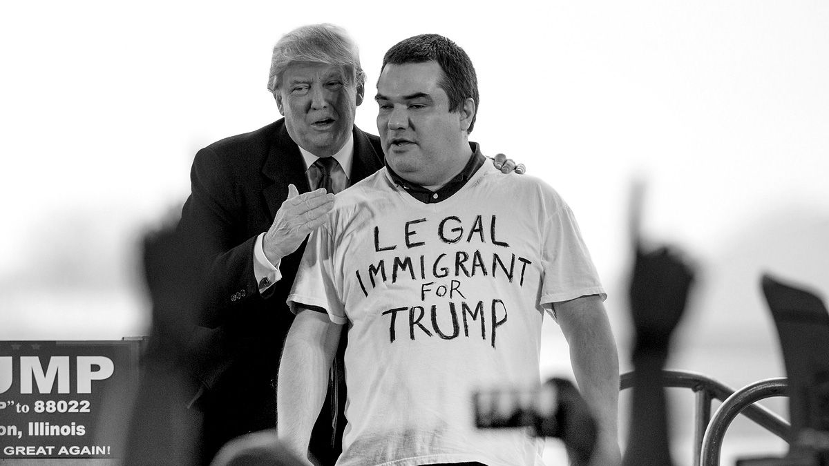 BLOOMINGTON, IL - MARCH 13:Republican presidential candidate Donald Trump pulls Alex Stypik from a crowd of supporters to show off his shirt during a rally at the Central Illinois Regional Ai