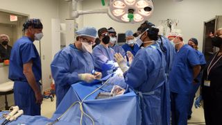 The surgery to transplant a heart from a genetically-modified pig into a human patient was carried out at the University of Maryland Medical Center four days ago. So far the patient is doing well.